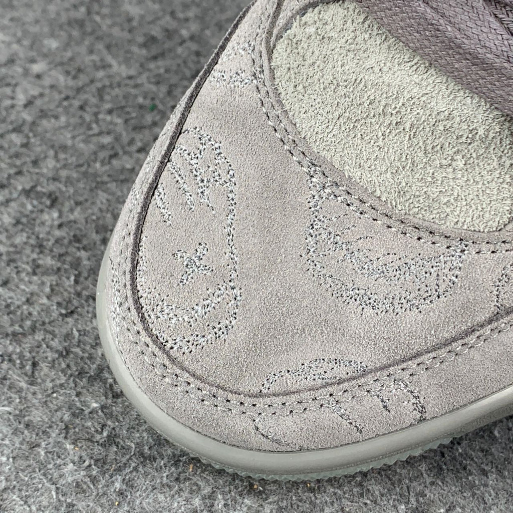 KAWS x Air Jordan 4 Retro 'Cool Grey' Sample